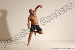 Underwear Gymnastic poses Man Black Muscular Bald Dancing Dynamic poses Academic